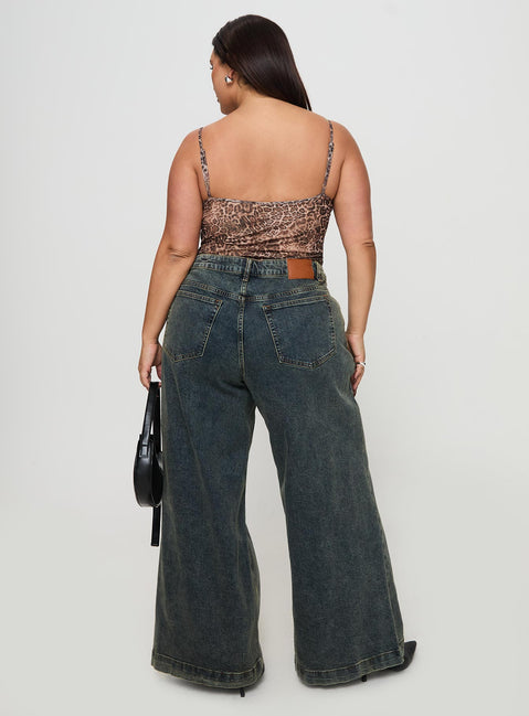 back view of model wearing Princess Polly Ziggie Low Rise Baggy Jeans Antique Wash Curve High Rise Jeans Jeans 