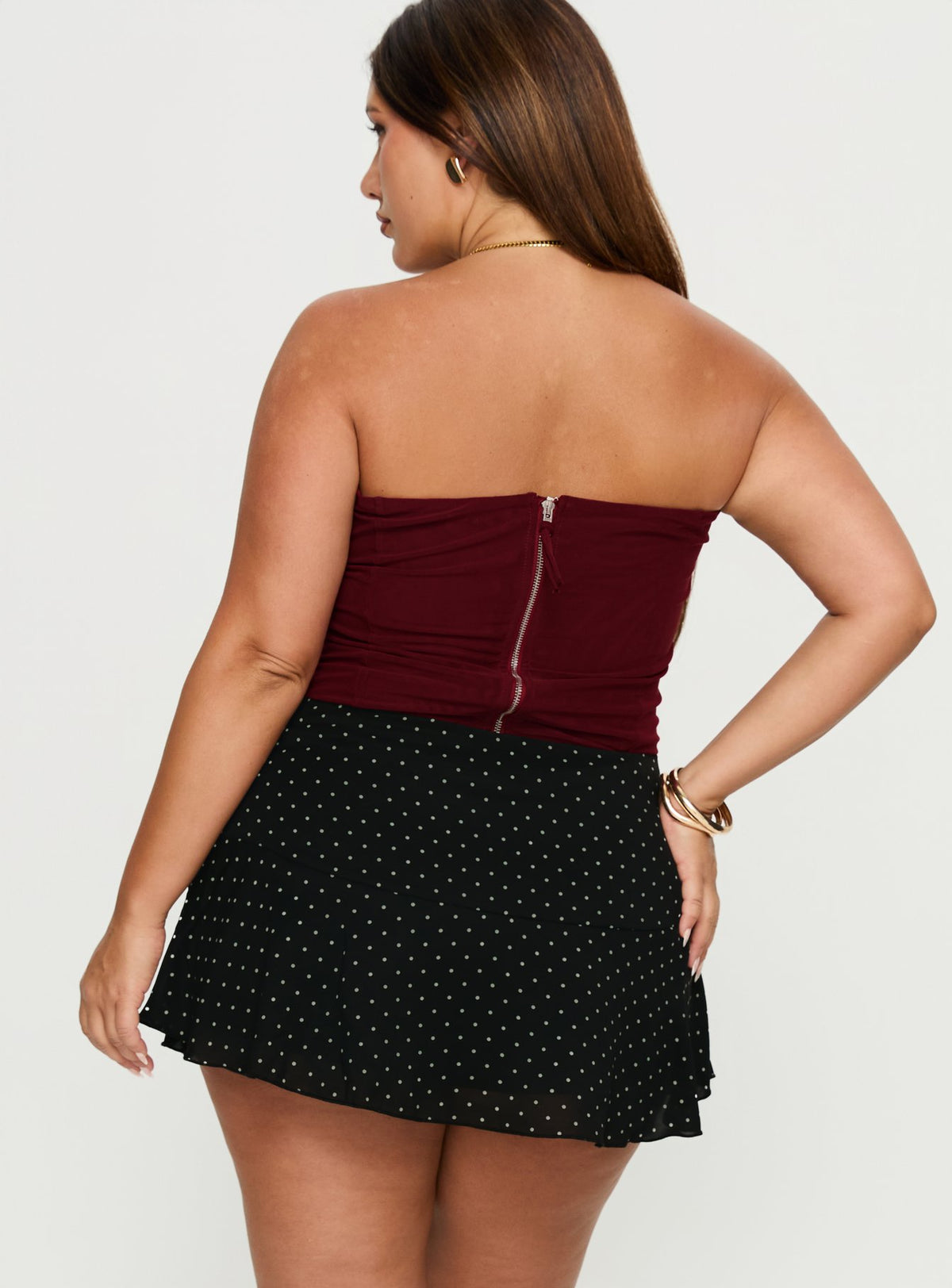 back view of model wearing Princess Polly Sonsie Mini Skirt Black / White Polka Curve Skirts 