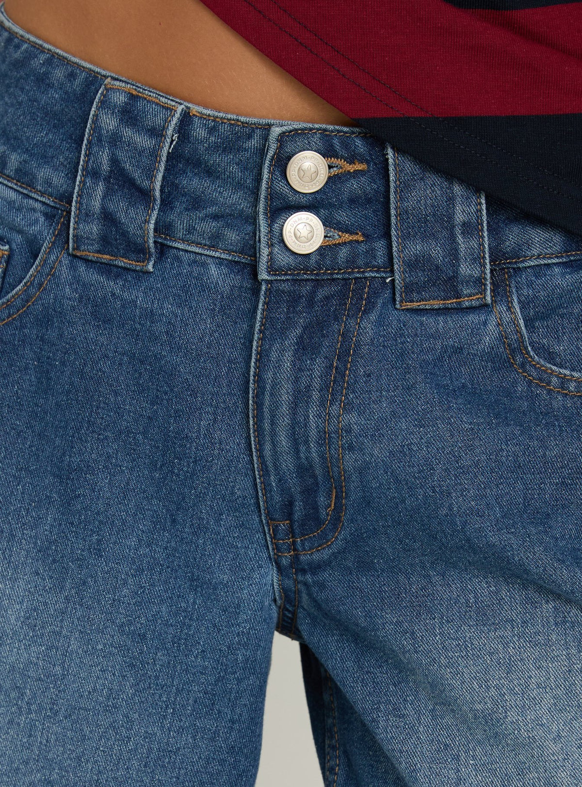 Crafted from Ramos Low Rise Double Button Distressed Wide Leg Denim Jeans in Mid Blue womens jeans product Princess Polly