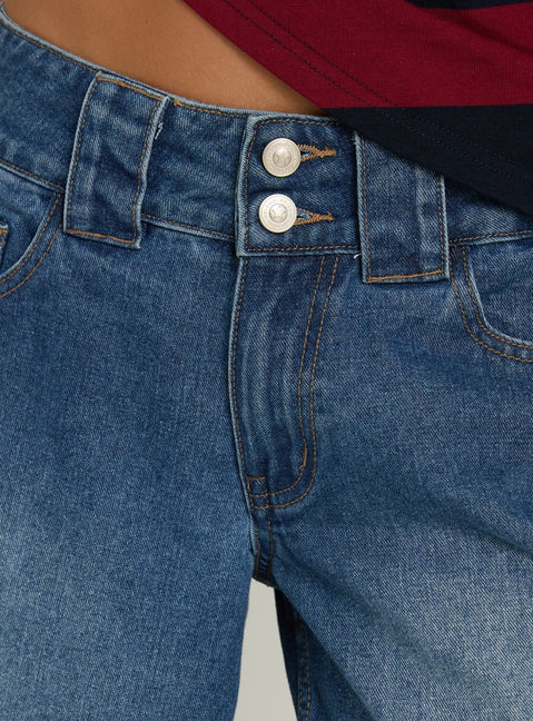 Crafted from Ramos Low Rise Double Button Distressed Wide Leg Denim Jeans in Mid Blue womens jeans product Princess Polly
