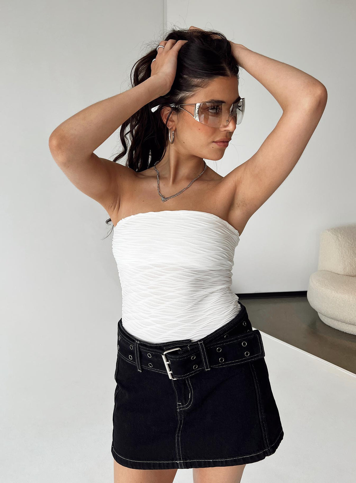 front view of model wearing Princess Polly Makena Strapless Bodysuit White Petite Sleeveless Bodysuit 