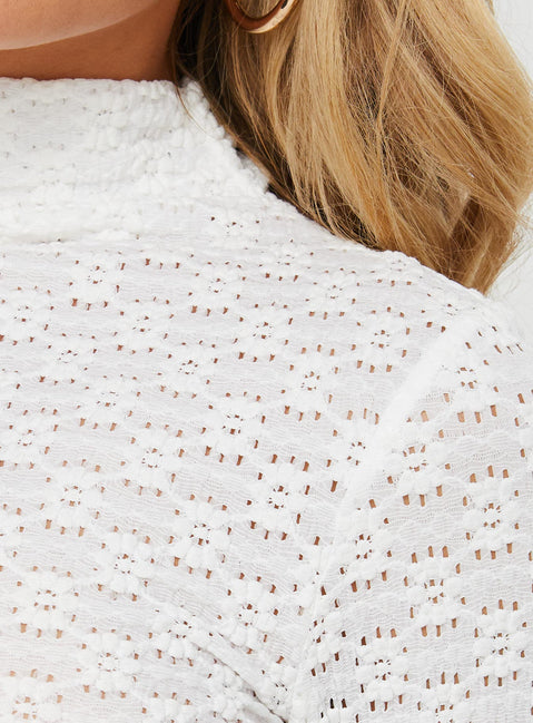 back view of model wearing Princess Polly Mazur Long Sleeve Mini Dress Cream High Neck 