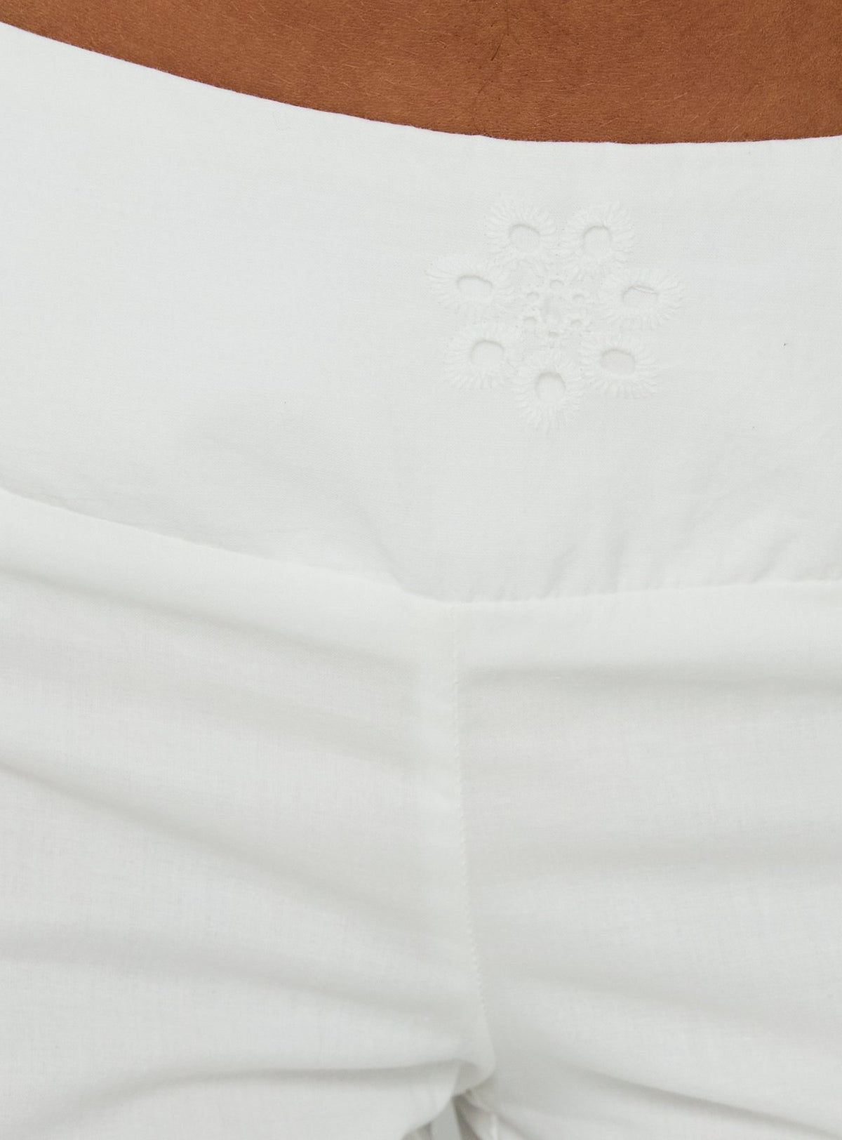 Close-up of Slow Days Broderie Anglais Mid Rise Pants White womens-regular-pants with mid-rise embroidery Princess Polly