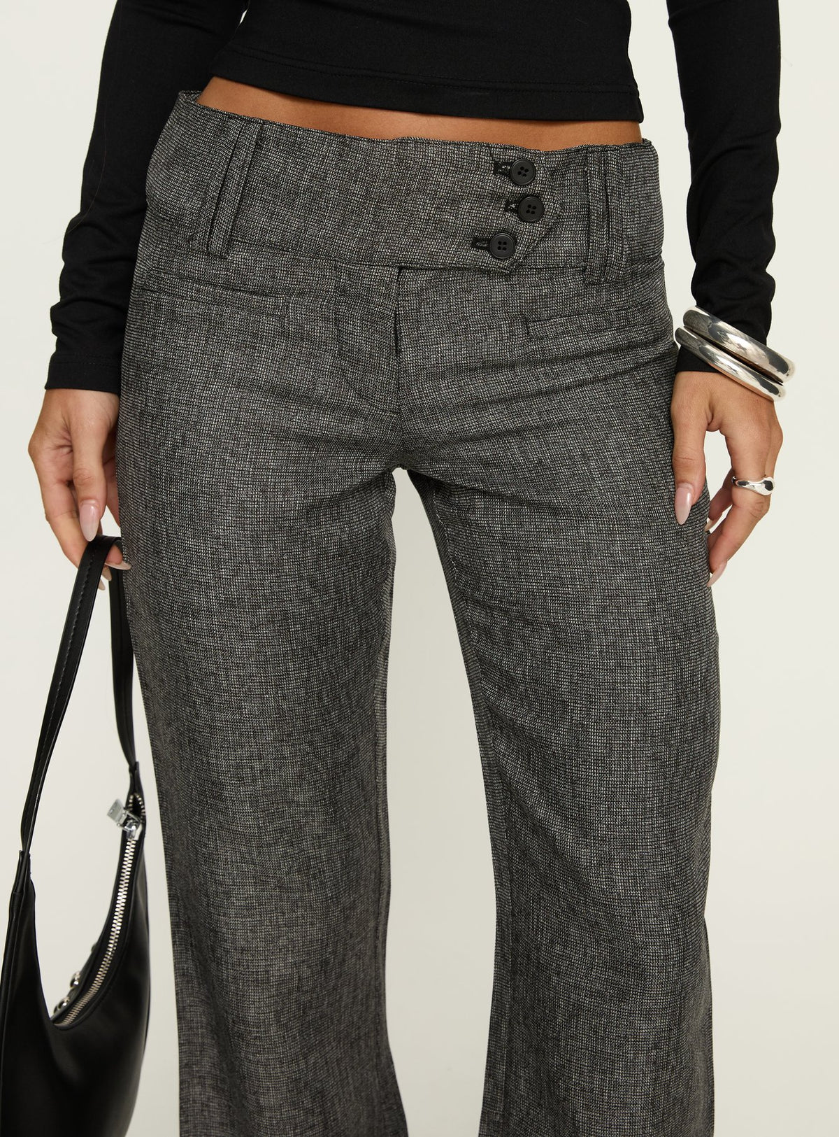 side view of model wearing Princess Polly Karola Asymmetrical Buckle Pants Grey Mid Rise Pants 