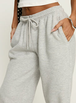 side view of model wearing Princess Polly Caspa Dream Fleece Oversized Ankle Cuff Jogger Grey Marle High Rise Pants Pants 