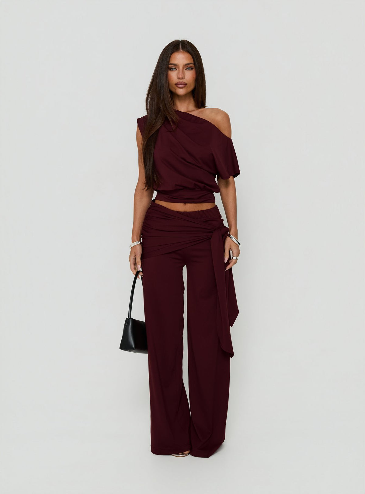 Showcasing Hadlia Tie Waist Pants Burgundy Petite womens-regular-pants with high-rise front view of model wearing