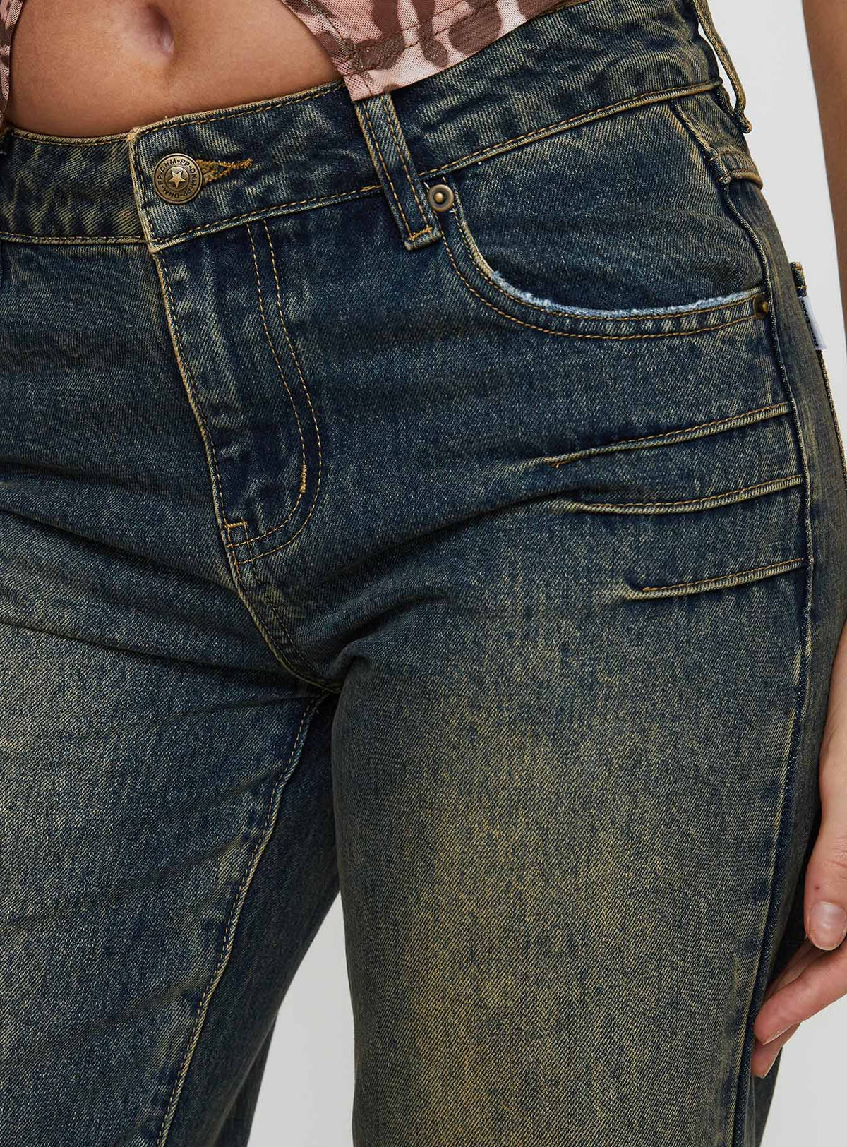 back view of model wearing Princess Polly Inverness Pinched Detail Mid Rise Wide Leg Jeans Tea Mid Rise Jeans Jeans 