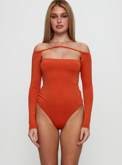 front view of model wearing Princess Polly Degree Of Seperation Buckle Detail Long Sleeve Bodysuit Orange Long Sleeve Tops Bodysuit 