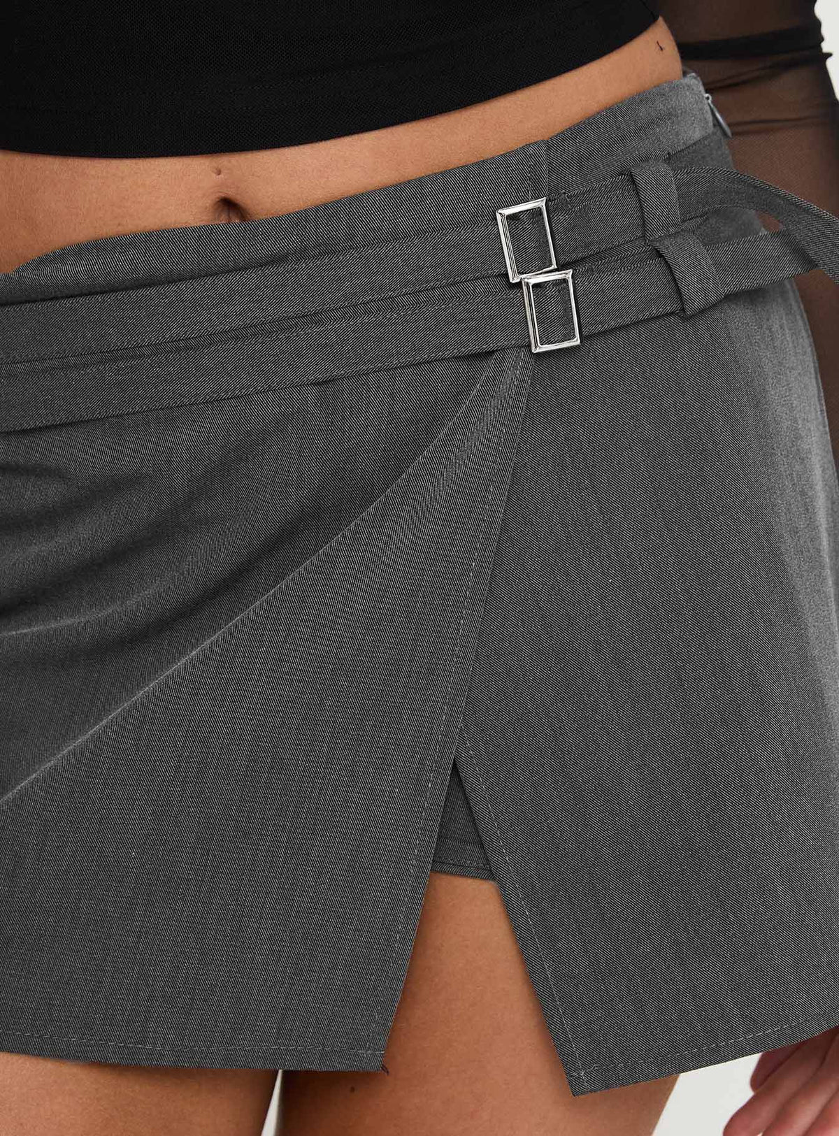 back view of model wearing Princess Polly Statuette Buckle Mini Skort Grey Mini Skirts Skirts 