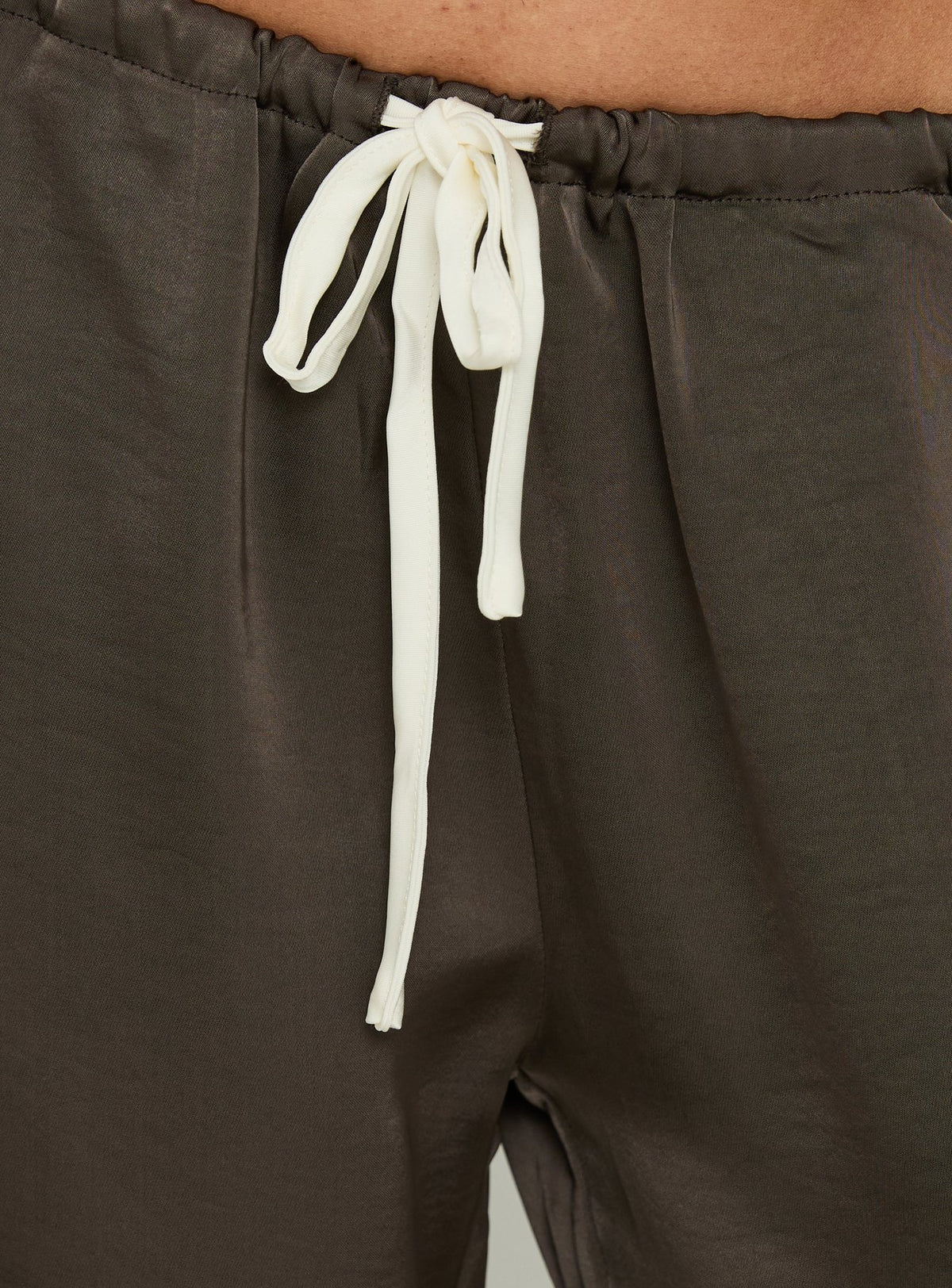 Highlighting the ivory tie belt detail on Dialled Up Satin Pants Mocha womens regular mid-rise wide-leg Princess Polly