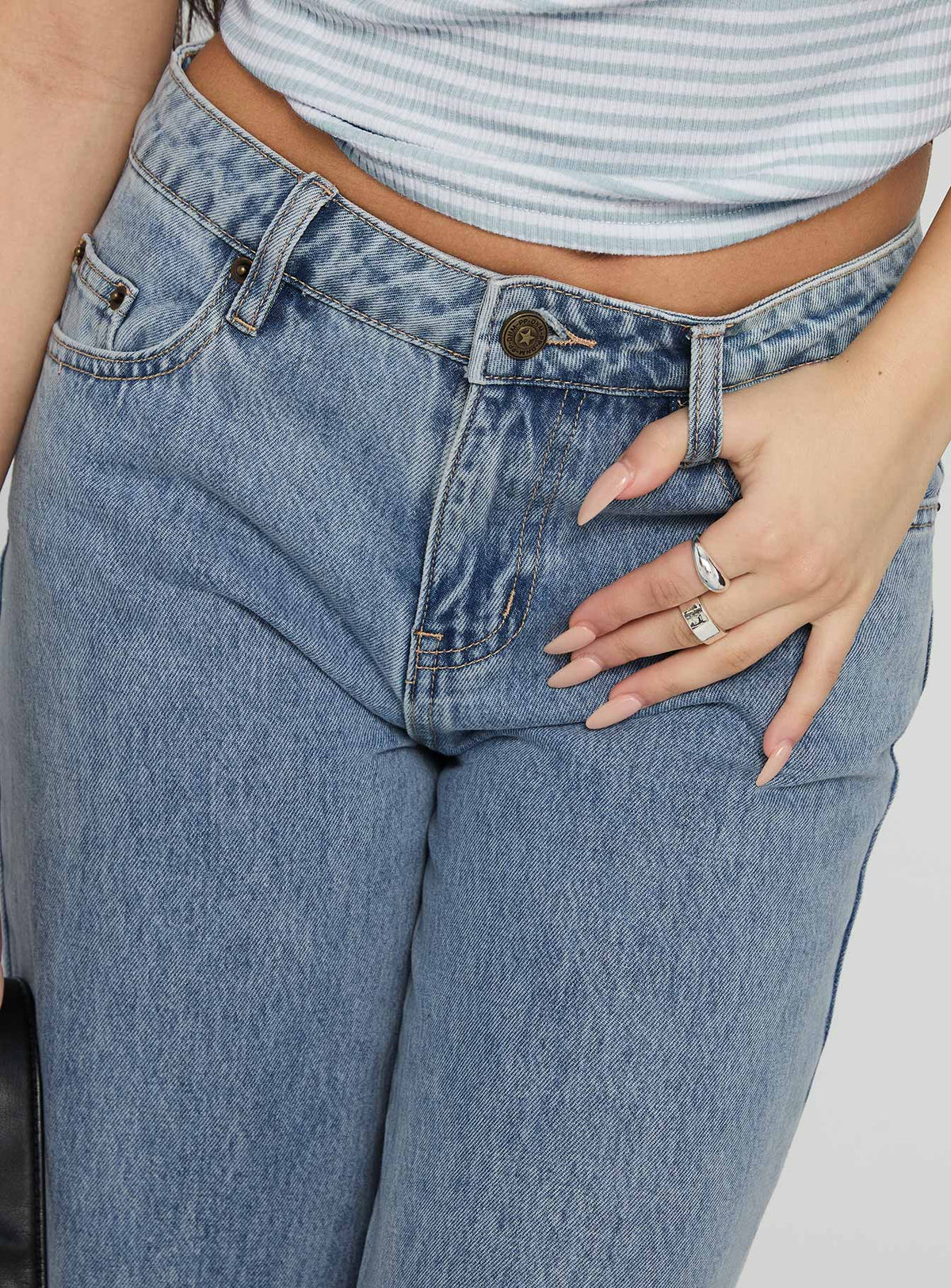 back view of model wearing Princess Polly Kadison Low Rise Straight Leg Jeans Mid Wash Blue Low Rise Jeans Jeans 