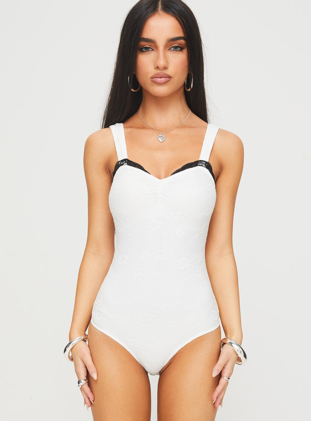 front view of model wearing Princess Polly Landry Lace Bodysuit White Sleeveless Bodysuit 