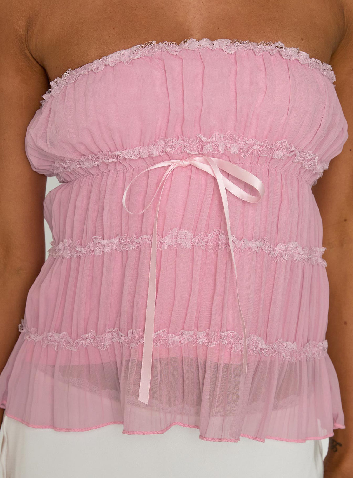back view of model wearing Princess Polly Avelina Strapless Top Pink Sleeveless straight 