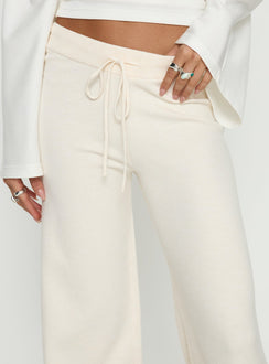 back view of model wearing Princess Polly Felisha Low Waist Knit Pants White Mid Rise Pants Pants 