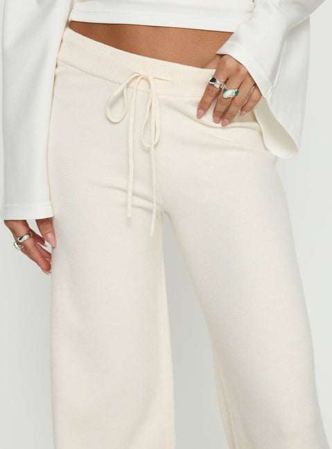 back view of model wearing Princess Polly Felisha Low Waist Knit Pants White Mid Rise Pants Pants 