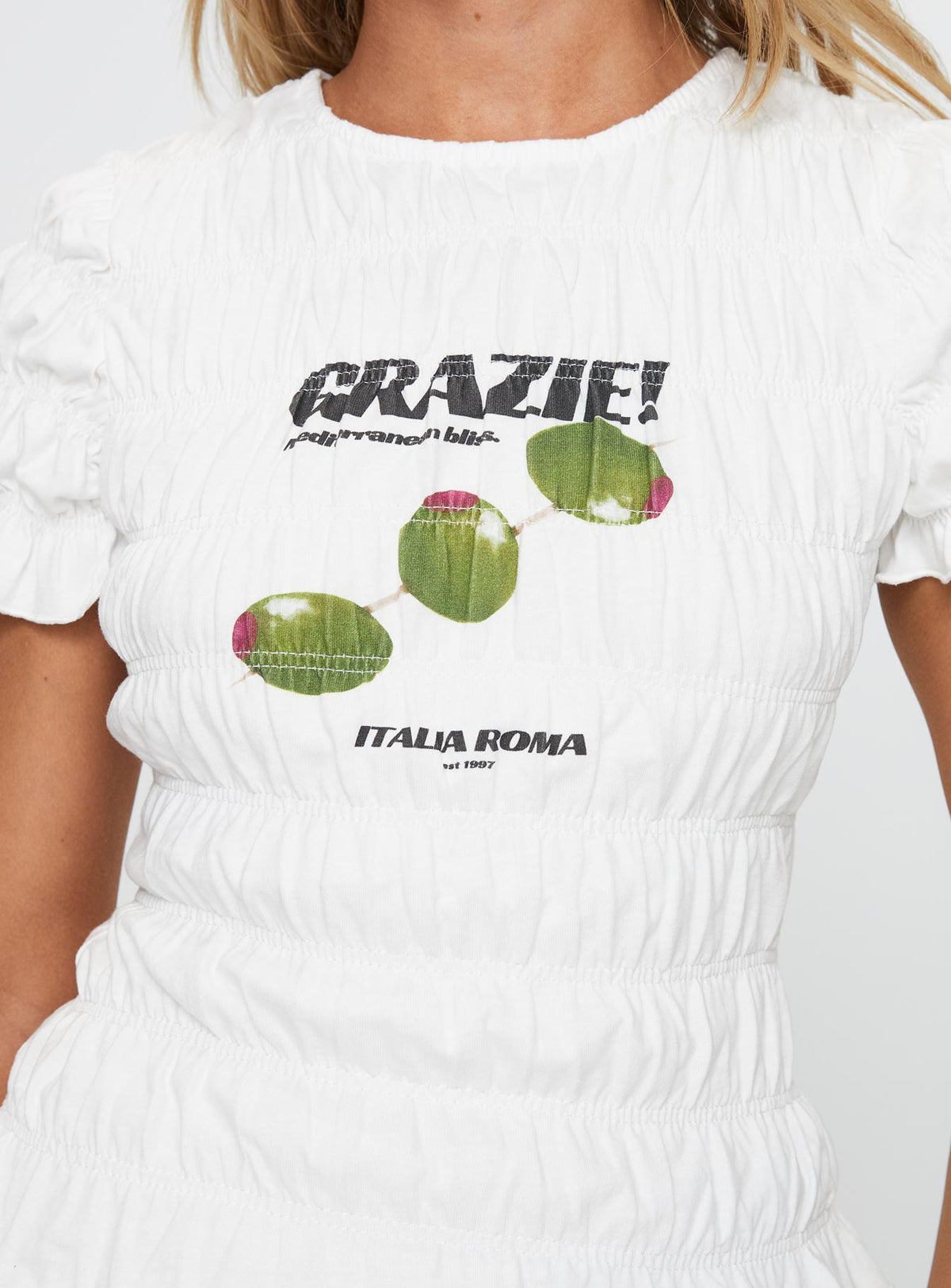 back view of model wearing Princess Polly Grazie Mille Shirred Graphic Top White / Green Short Sleeves Crew Neck 