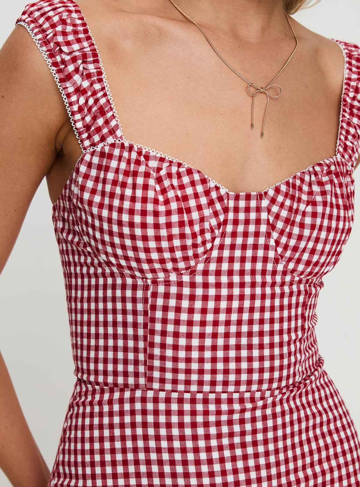 back view of model wearing Princess Polly Faubert Mini Dress Red Gingham Sweetheart Neckline 