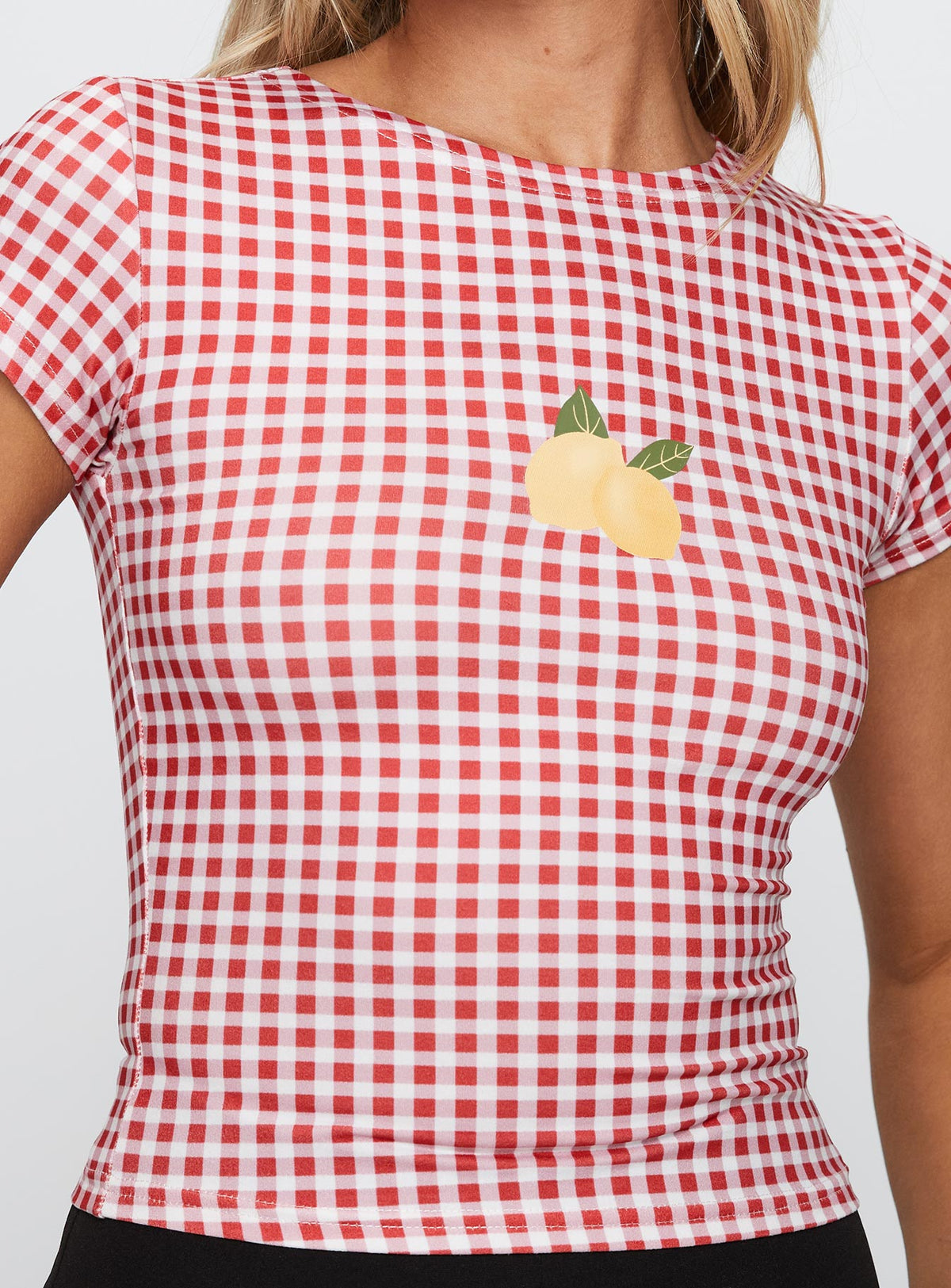 back view of model wearing Princess Polly Marcello Graphic Top Red Check Sleeveless Crew Neck 