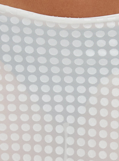 Capturing style, the Evangela Sheer Midi Skirt White Polka Dot womens-skirts in midi length product Princess Polly