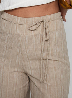 side view of model wearing Princess Polly Rush Hours Tie Up Pants Beige Pants 