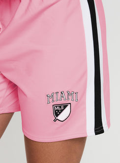 back view of model wearing Princess Polly Bend It Athletic Shorts Pink Low Rise Shorts 