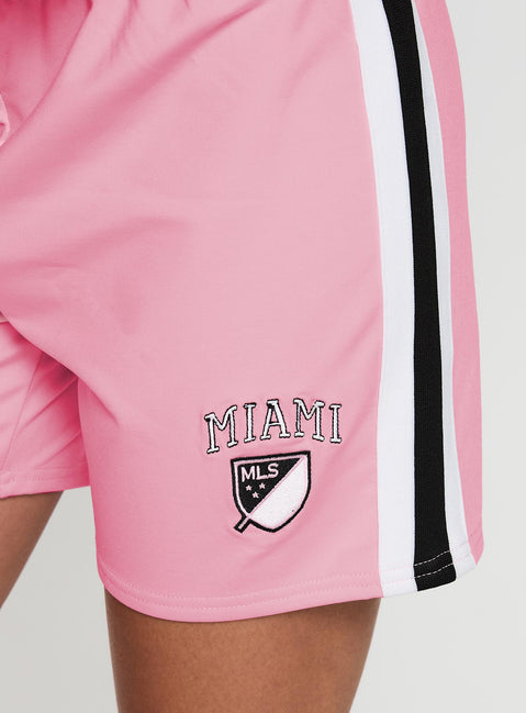 back view of model wearing Princess Polly Bend It Athletic Shorts Pink Low Rise Shorts 