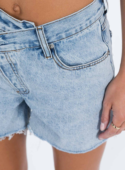 back view of model wearing Princess Polly Xena Denim Shorts Tall High Waisted Shorts 