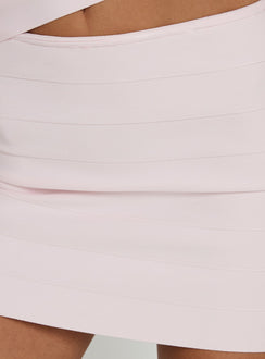 Highlighting the Justina Bandage Mini Skirt Pink in womens-skirts with mini length Princess Polly