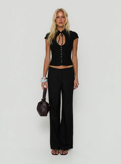 Showcasing Agazia No Waist Low Rise Straight Pants Black in womens regular pants front view of model wearing
