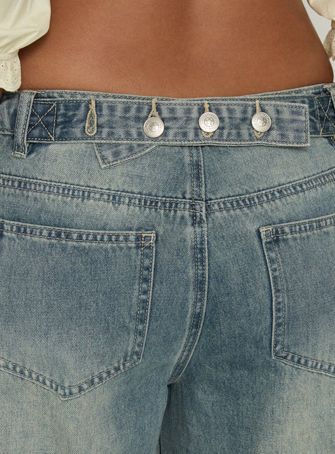 Designed with the Karlos Low Rise Cinched Baggy Jeans Vintage Mid Blue Wash in womens-jeans featuring abstract print and belt detail Princess Polly