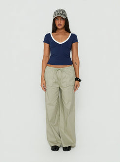 Showcasing the Toren Drawstring Straight Leg Pants Stone womens-regular-pants with mid-rise front view of model wearing Princess Polly