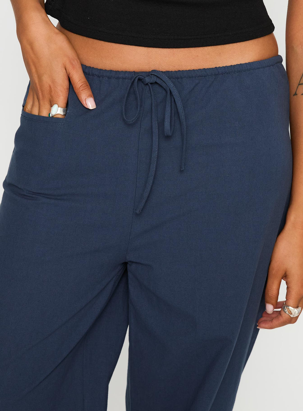 front view of model wearing Princess Polly Zodie Low Waist Pants Navy Low Rise Pants Pants 