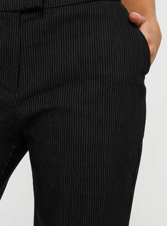 back view of model wearing Princess Polly Jeller Pinstripe Pants Black Petite High Rise Pants Pants 