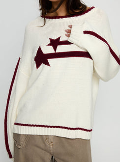 front view of model wearing Princess Polly Star Track Graphic Jumper Cream / Red Longline Jumpers Jumpers 