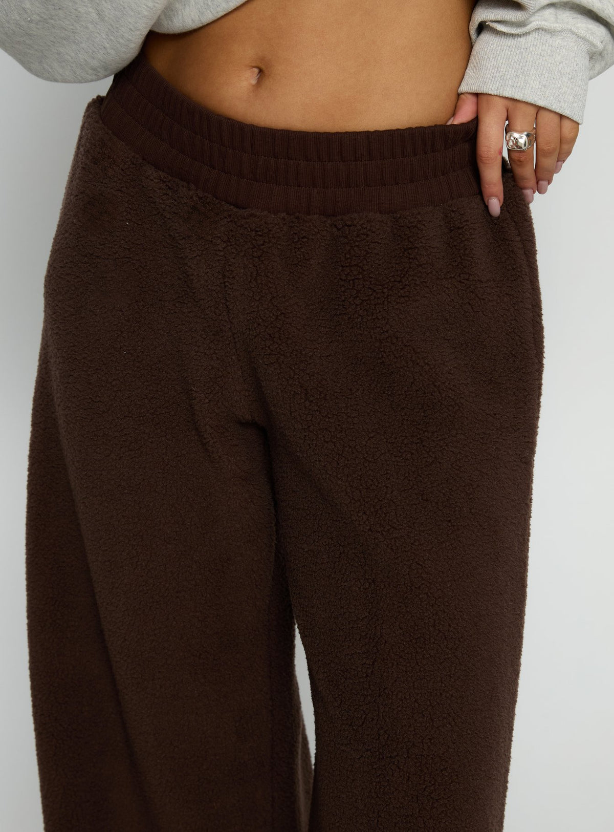 back view of model wearing Princess Polly Siberia Fleece Track Pant Chocolate Brown High Rise Pants Pants 