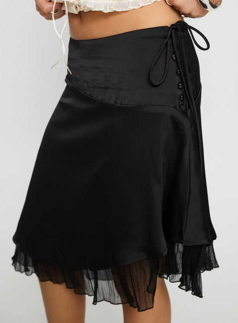 back view of model wearing Princess Polly Rosemead Satin Midi Skirt Black Midi Skirts Skirts 