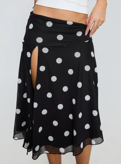   side view of model wearing Princess Polly Dulciana High Split Asymmetrical Midi Skirt Black / Polka Dot Midi Skirts Skirts 