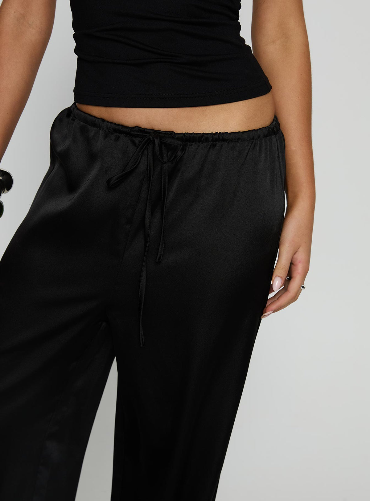 front view of model wearing Princess Polly Soulstar Satin Pants Black High Rise Pants Pants 