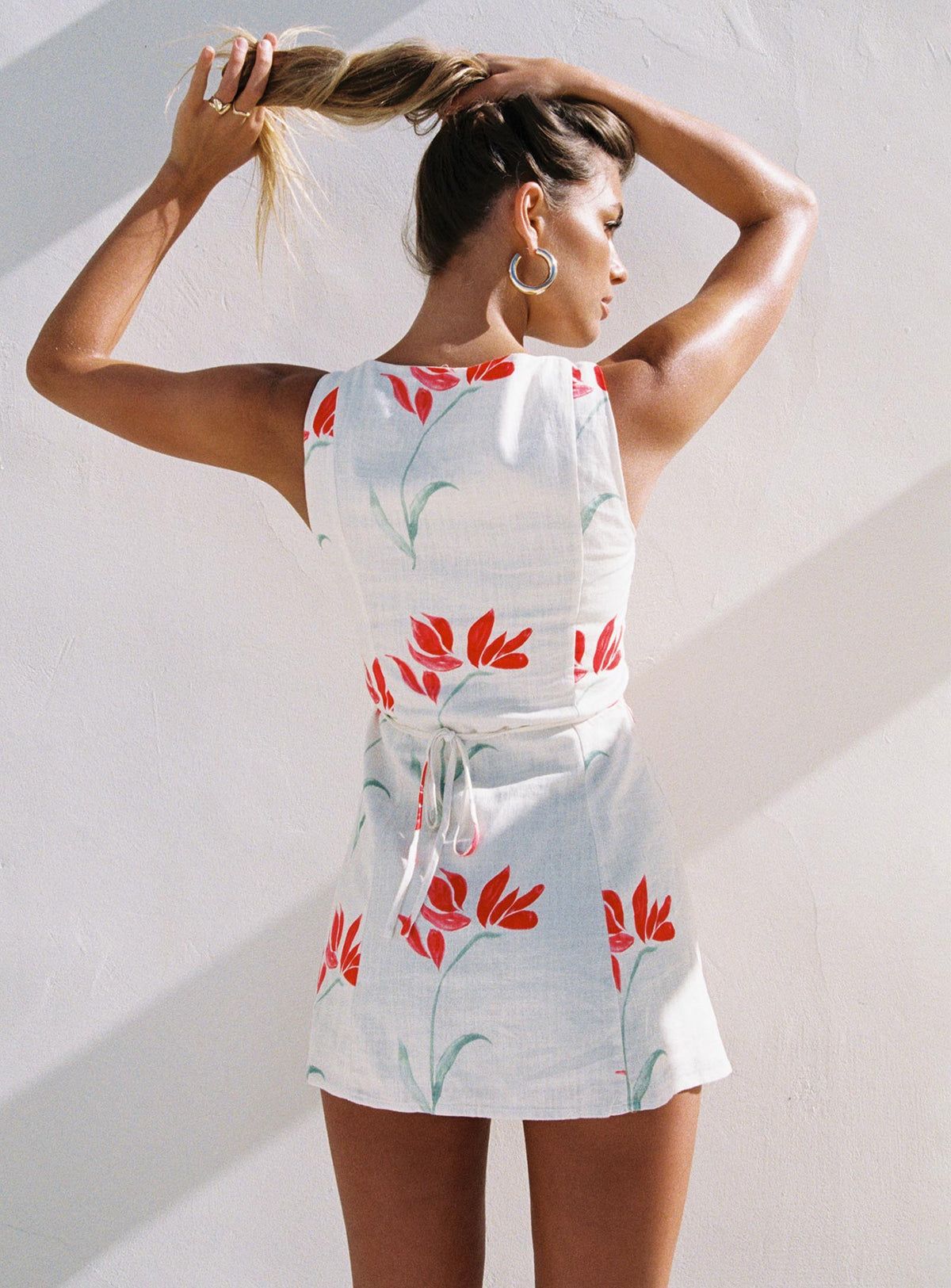 front view of model wearing Princess Polly Dollie Linen Mini Dress Floral High Neck 
