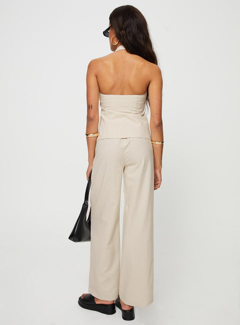 Matching linen set Halter neck top, fixed halter strap, button fastening at front, twin hip pockets High rise pants, belt looped waist, zip and button fastening, elasticated waistband at back, twin hip pockets, straight leg