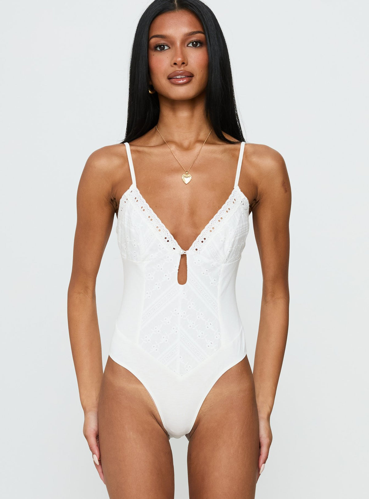 front view of model wearing Princess Polly Nerisse Keyhole Bodysuit White Sleeveless Bodysuit 