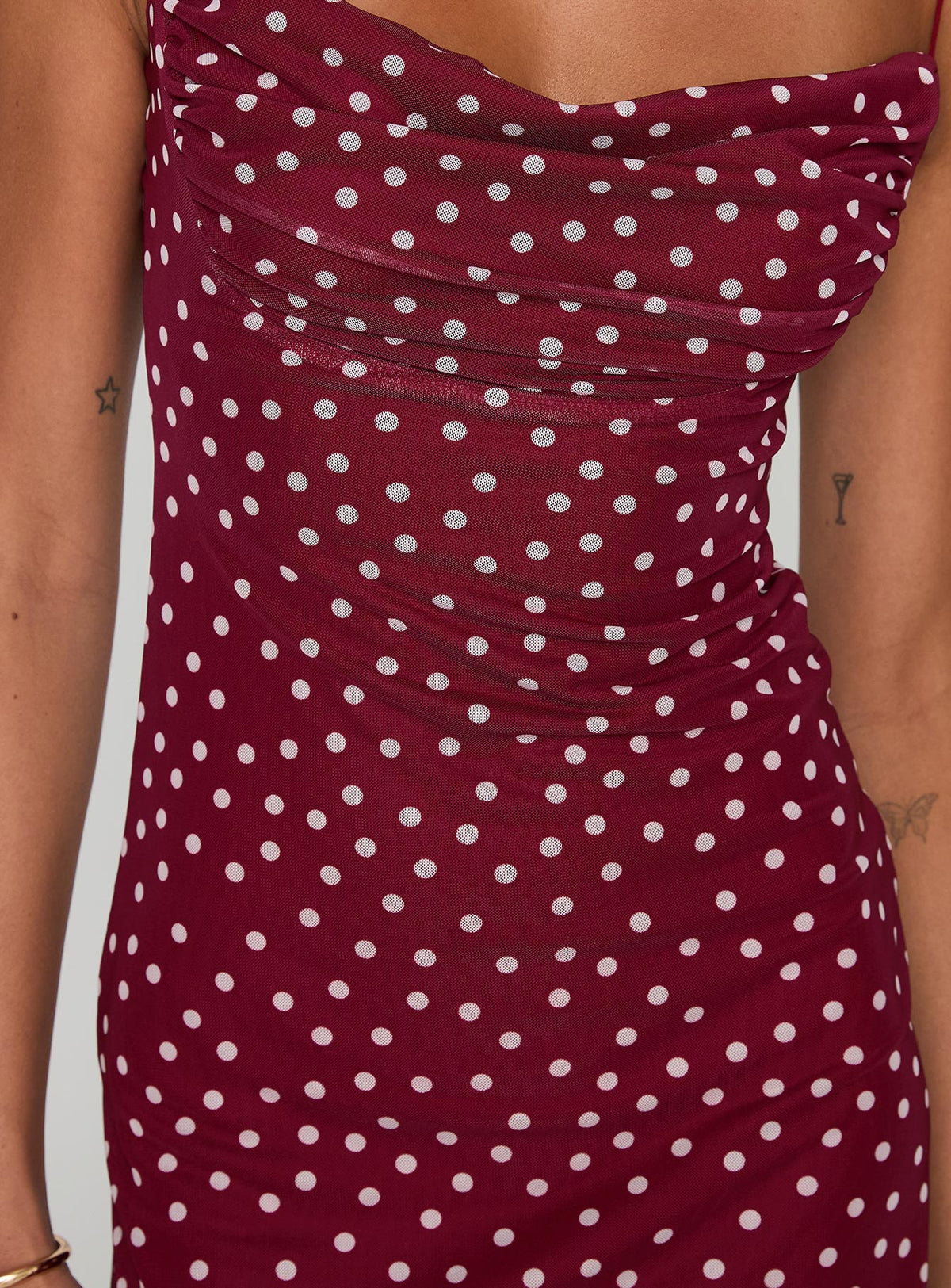 front view of model wearing Princess Polly Sugar Mini Dress Red Polka Cowl Neck 