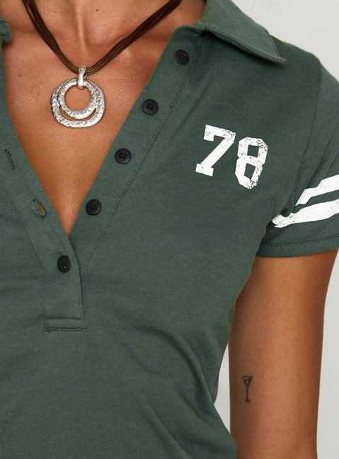 back view of model wearing Princess Polly Polo 78 Top Green Short Sleeves V-Neck 