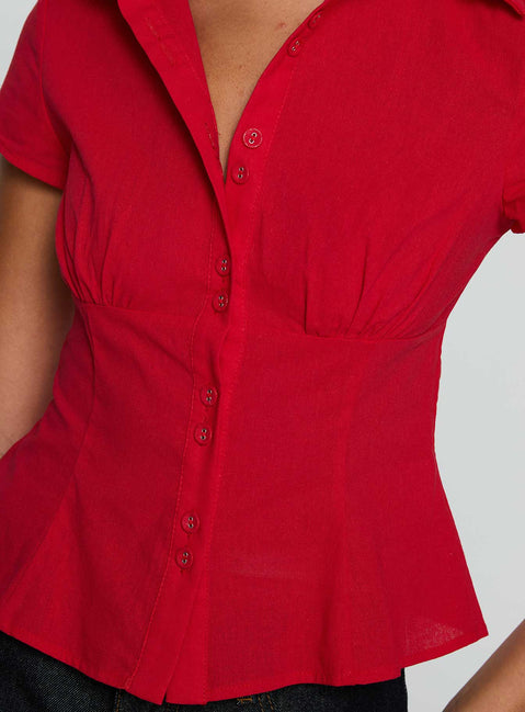 back view of model wearing Princess Polly Cottesloe Blouse Top Red Short Sleeves V-Neck 