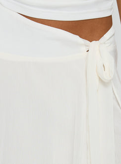 Crafted in ivory, the Ophella Tie Waist Chiffon Midi Skirt Cream womens-skirts with asymmetry and layered details product Princess Polly