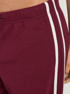 Crafted from cherry fabric, the Kennah Wide Leg Sweat Pants in womens-regular-pants with mid-rise waist front view of model wearing Princess Polly