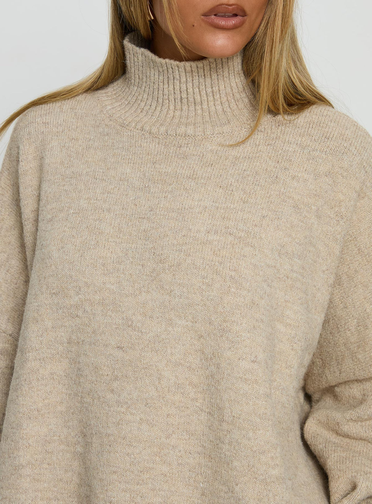 back view of model wearing Princess Polly Patrizia Funnel Neck Knit Sweater Beige Jumpers 