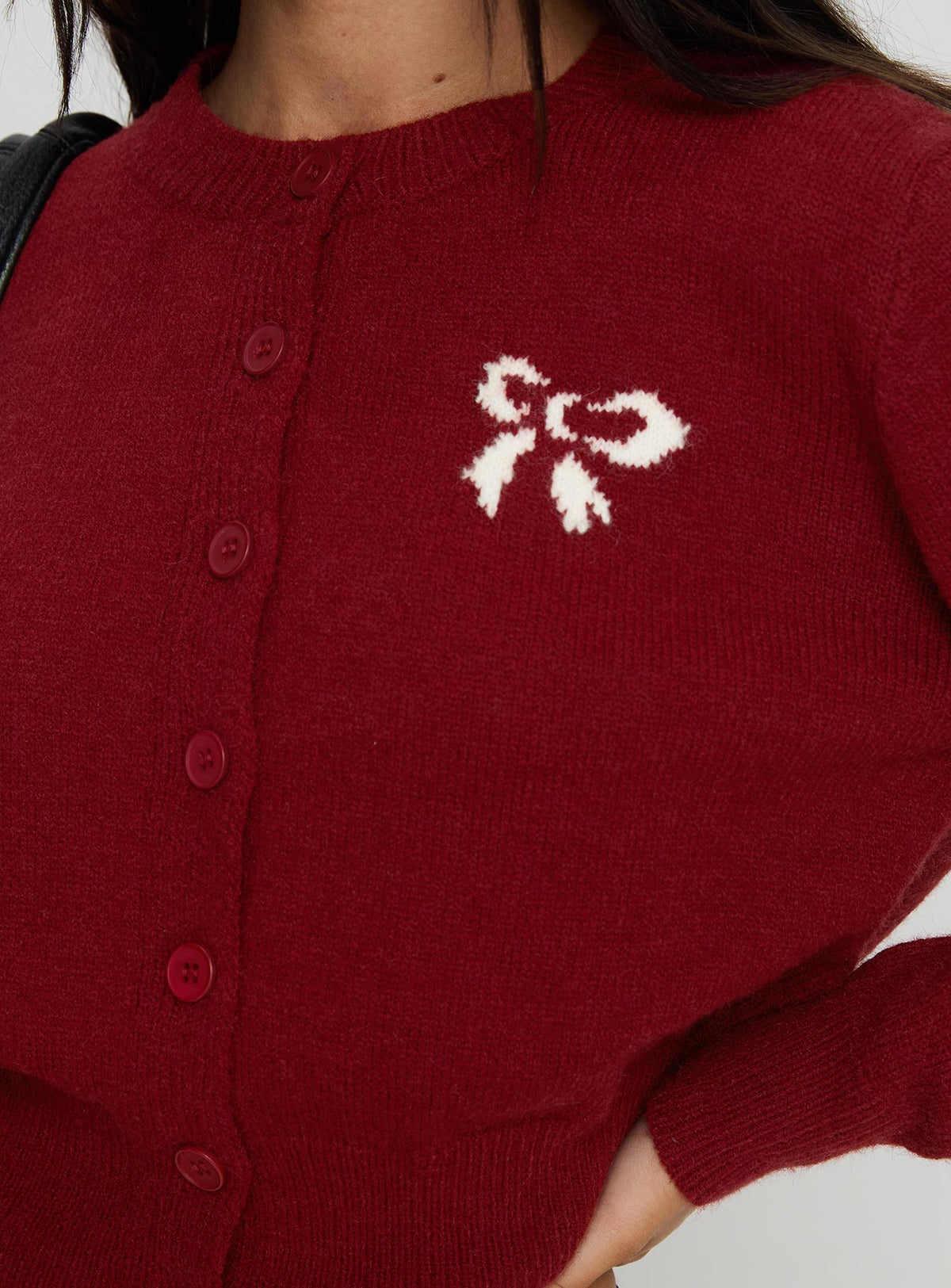 back view of model wearing Princess Polly With A Bow Cardigan Red Jumpers 