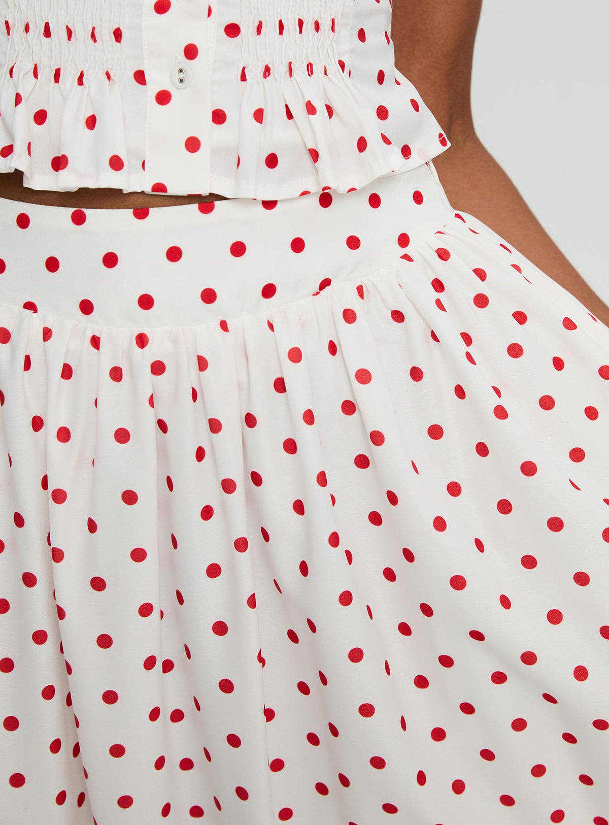   side view of model wearing Princess Polly Valerio Maxi Skirt White / Red Maxi Skirts Skirts 