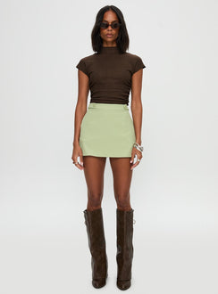   front view of model wearing Princess Polly Hosier Twill Mini Skirt Green Skirts 
